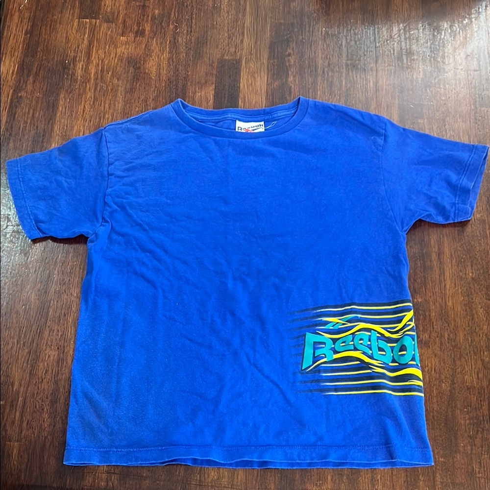 Vintage 90’s Reebok Kids Blue Graphic T-Shirt